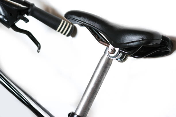 istock Bicycle seat and handle closeup. white background, black seat and handle 883181580