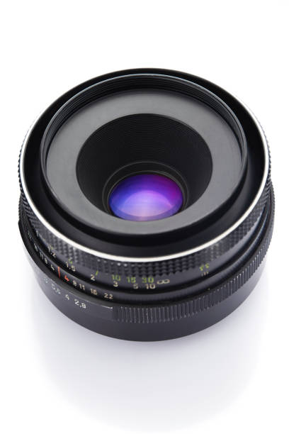 istock SLR camera lens on white background 883184970