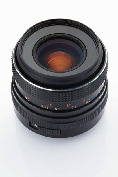 istock SLR camera lens on white background 883185048