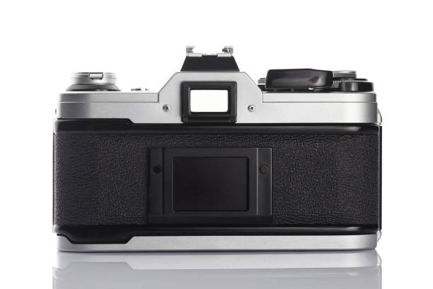 istock Old vintage film camera on white background 883190046