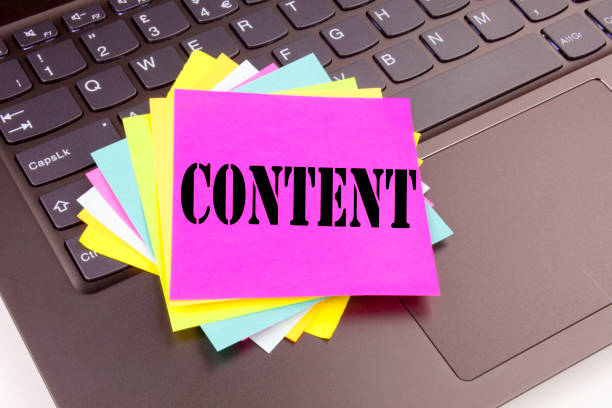istock Writing Content text made in the office close-up on laptop computer keyboard. Business concept for Business to Success Workshop on the black background with copy space 883191434