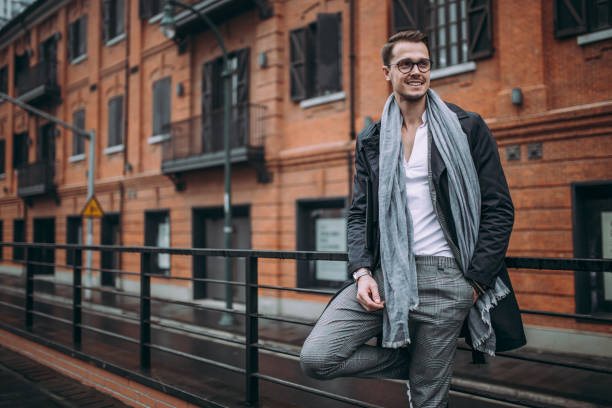 istock Attractive hipster man standing outdoors 883197794