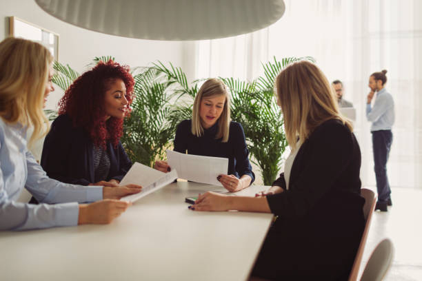 istock Women Working Together In The Modern Office 883202402
