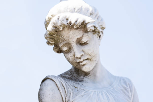 istock Face of angel, old marble statue, background with copy space 883215284