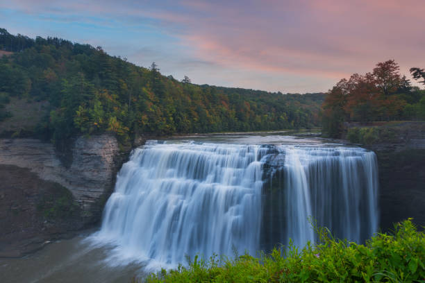 Sunset at Middle Falls in Letchworth State Park Beautiful autumn sunset at Letchworth State Park in New York of Middle Falls. letchworth state park stock pictures, royalty-free photos & images