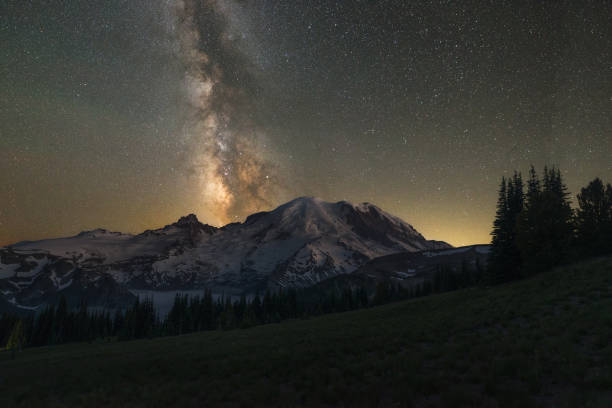 istock Milky Way Galaxy drifting behind Mount Rainier in Washington State 883219174
