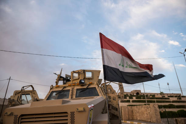 Iraqi MRAP vehicle at Nabi Yunus shrine in Mosul, Iraq Mosul, Iraq - May 23, 2017: In the Iraqi city of Mosul, an Iraqi army Mine-Resistant Ambush Protected (MRAP) vehicle is parked at the entrance to the shrine of Nabi Yunus, which was destroyed by ISIS in 2014. islamic state stock pictures, royalty-free photos & images