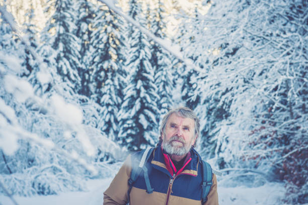 istock Senior Mountaineer in Alps, Winter 883229010