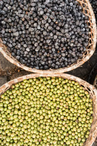 Photo of Acai berry and white acai, the small superfruit from the brazilian amazon