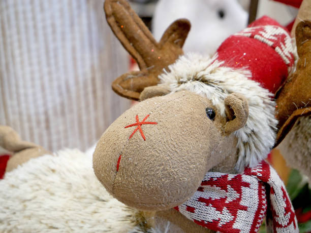 istock Funny Christmas reindeer in Santa hat. 883233872