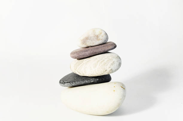 istock Stones black and white pyramid on white background 883234956