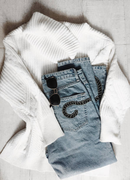 istock sweater jeans and sunglasses concept 883235016