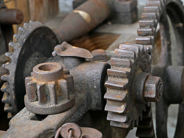 istock Old machinery details closeup. Rusty gear wheels. 883261292