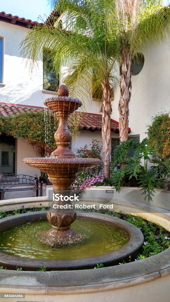 Indoor courtyard and fountain spanish-style architecture of church in Redlands California Fountain Stock Photo