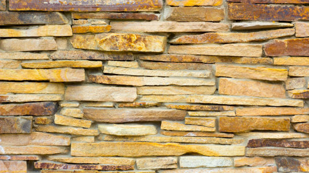 istock Modern Multi Color Stone, slate travertine sandstone Wall used for Background 883264732