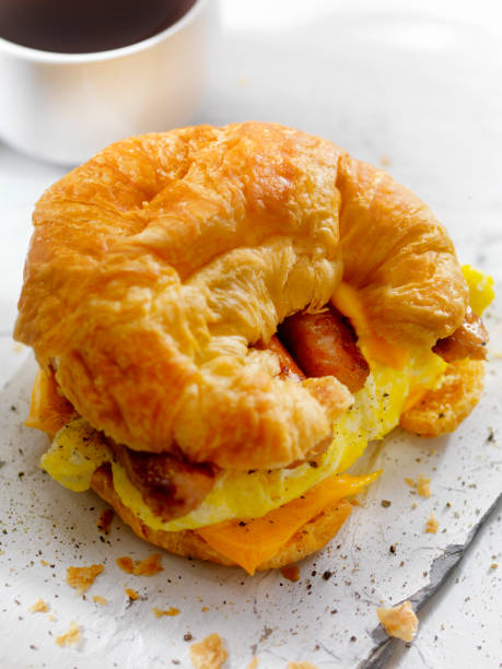 istock Egg, Sausage and Cheese Breakfast Croissant 883265126