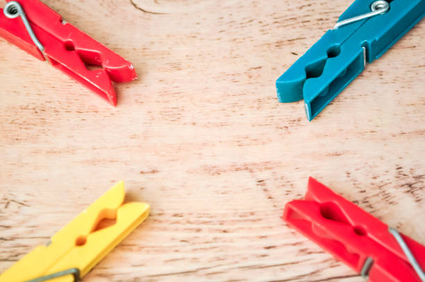 istock Clips for drying clothes indoors and outdoors. Holders wet cloth 883269336