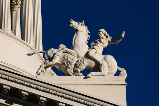 Statue With Woman And Child On Horse With Bison California State Capitol Building Blue Sky Columns Bird Sitting On Ear