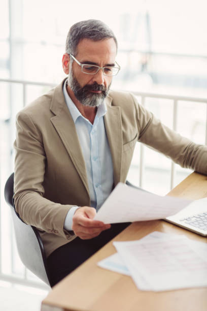 istock Businessman working in the office 883311744