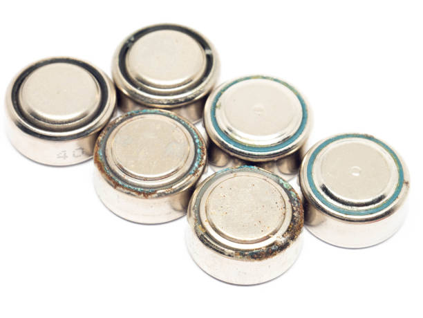 istock small watch rusty batteries isolated on white background 883347854