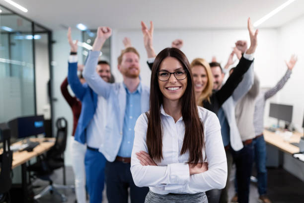 istock Group picture of business team posing in office 883360052