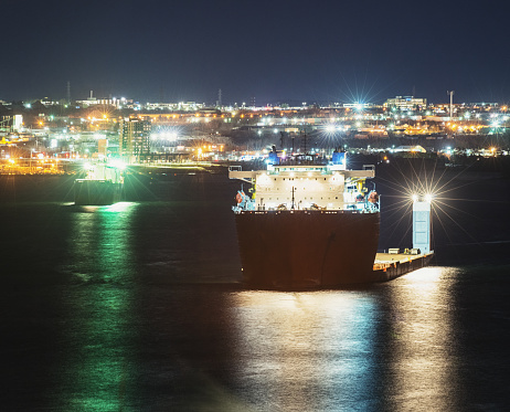 A semi submersible heavy lift vessel and oil tanker anchored in the Bedford Basin.