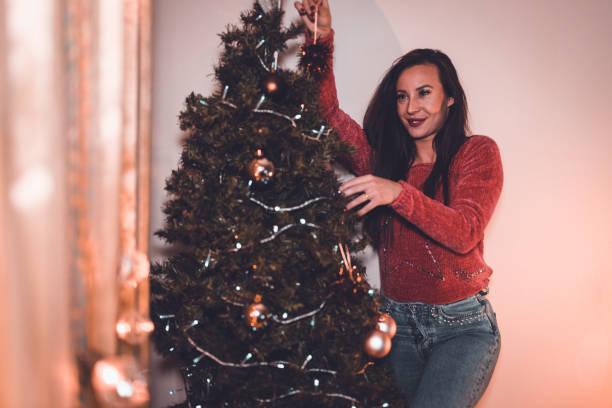 istock Christmas tree decoration at home 883413048
