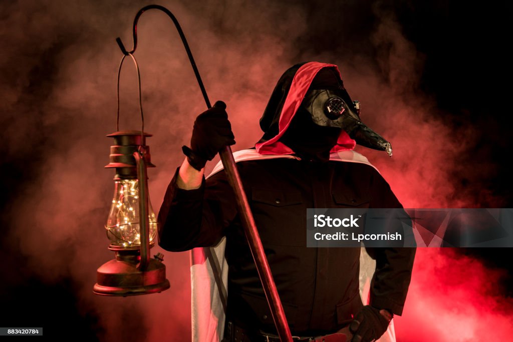 The Plague Doctor Theatrical lighitng, special effects, and a leather mask bring this evil plague doctor variation to life. Halloween/horror inspired Bird Stock Photo