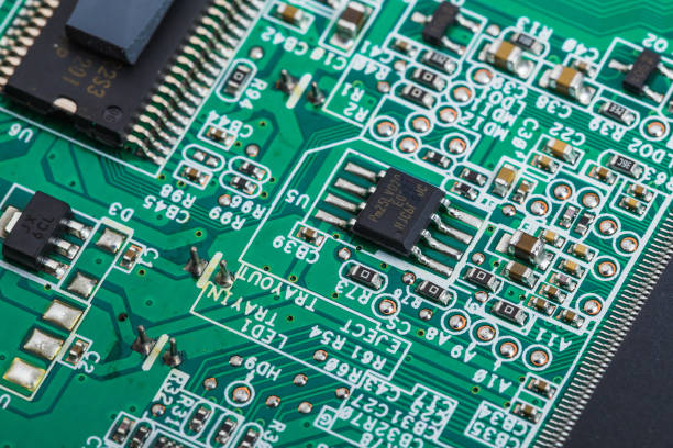 istock Close up of electronic circuit board 883560646