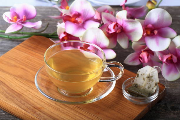 istock Glass teacup of green tea 883570518