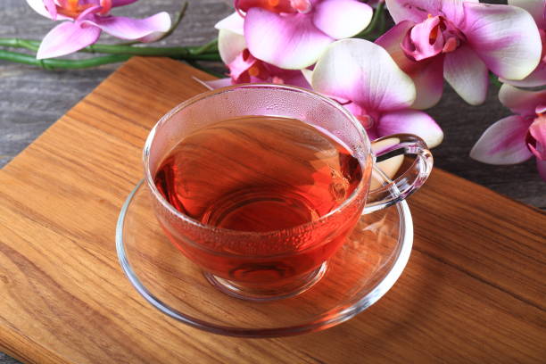 istock Glass teacup of black tea 883570600