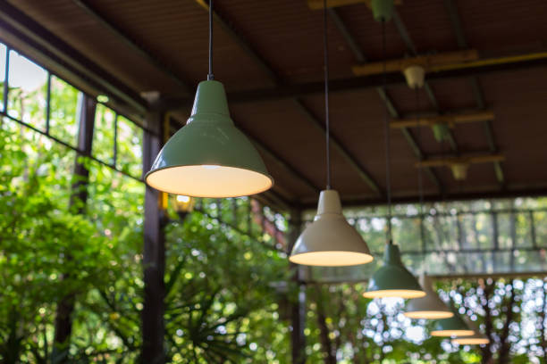istock beautiful retro light lamp decor in coffee shop on the ceiling 883577460