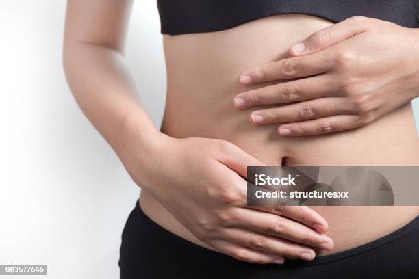 Pregnancy Or Diet Concept Stock Photo - Download Image Now - Abdomen, Massaging, Human Abdomen