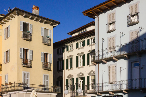 verbania lago maggiore facades and places in italy spring sunny morning with bright strong colors under blue mediterranean sky