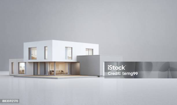 Modern House On White Floor With Empty Concrete Wall Background In Real Estate Sale Or Property Investment Concept Buying New Home For Big Family Stock Photo - Download Image Now