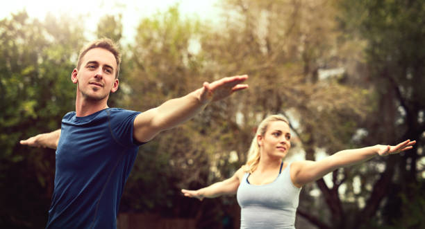 istock Pushing their stresses away through yoga 883644226