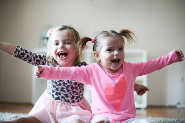 istock Happy little girls. 883657388
