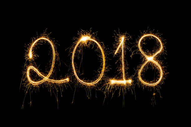 istock 2018 written with Sparkle firework,happy new year 883658140