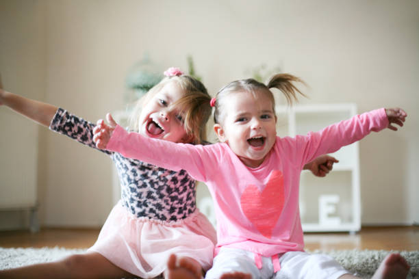 istock Happy little girls. 883662312