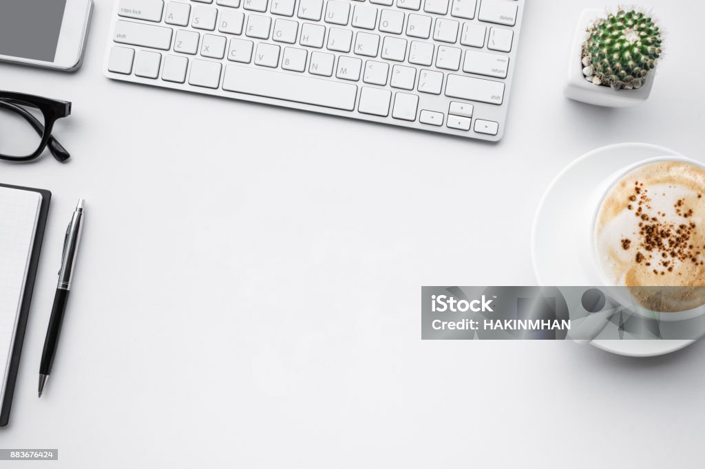 Business table top with mock up Office supplies on white Business table top with mock up Office supplies on white background.Flat lay design.Copy space Desk Stock Photo