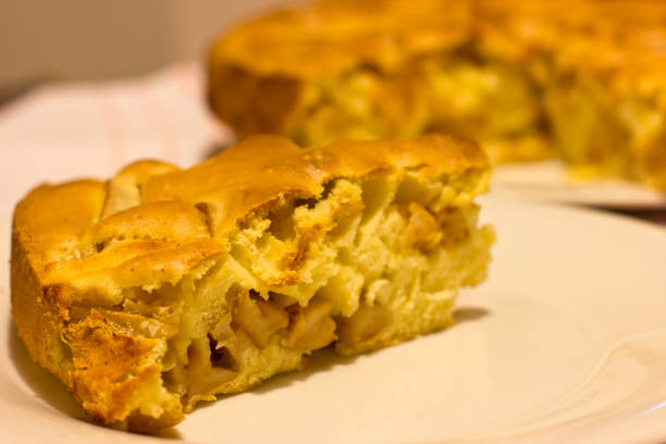 istock Apple pie Charlotte on the linen napkin 883678986