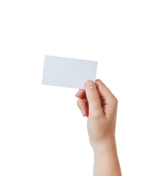 istock Hand holding blank business card aloft 883679468