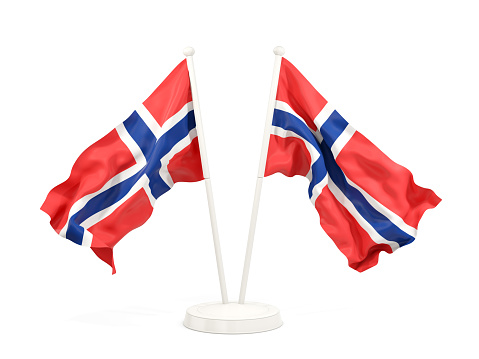 Two waving flags of norway isolated on white. 3D illustration