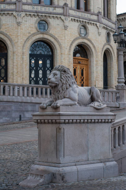 istock Stone statue of lion in Oslo 883688504