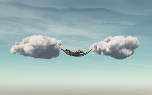 Young man relaxes in a hammock between two clouds. This is a 3d render illustration