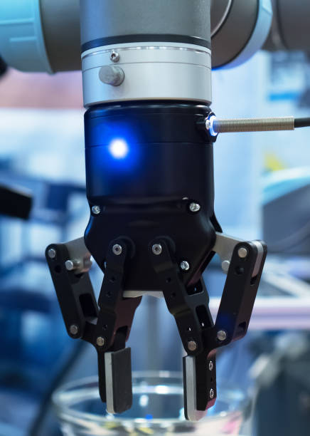 istock Industrial robotic arm in laboratory. 883702970