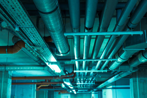 istock Cables and Pipes in Underground Parking 883703452
