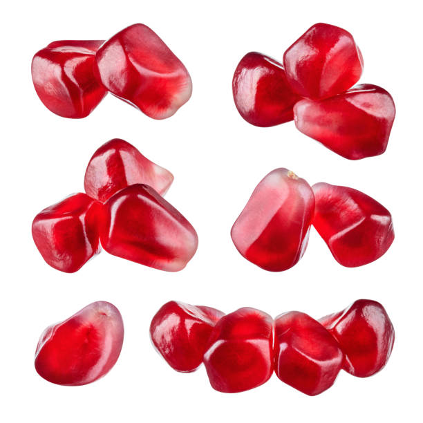 Pomegranate. Pomegranate seeds isolated on white. Collection. Macro. With clipping path.
