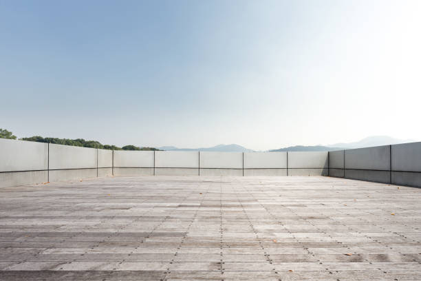 istock empty marble floor with beautiful lake in blue sky 883706524