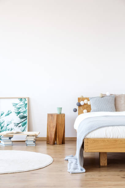 istock Wooden shelf supported by books 883706558